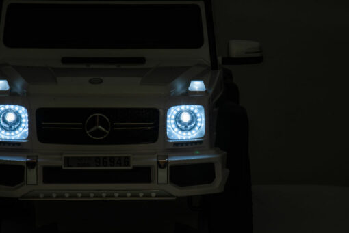Kinderfahrzeug - Elektro Auto "Mercedes G63 AMG 6x6" - lizenziert - 12V7AH Akku + 2,4Ghz+Ledersitz+EVA – Bild 7