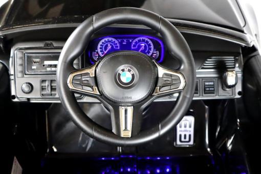 Elektro Kinderfahrzeug "BMW M5" - lizenziert - 12V7A Akku, 2 Motoren- 2,4Ghz Fernsteuerung, MP3, Ledersitz+EVA- Schwarz – Bild 6