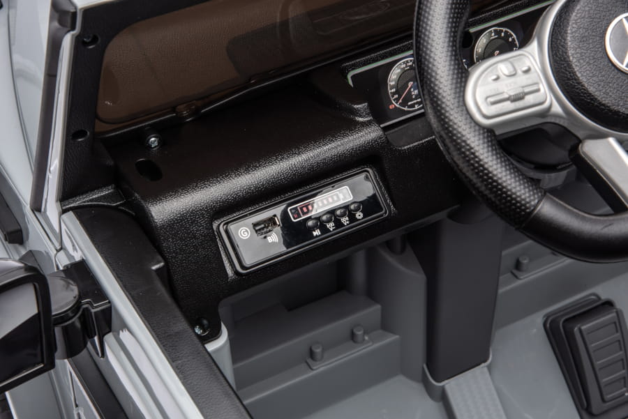 Kinderfahrzeug - Elektro Auto "Mercedes G63 AMG" - Lizenziert - 12V7AH Akku,2 Motoren- 2,4Ghz Fernsteuerung, MP3+Ledersitz+EVA-Silber – Bild 7